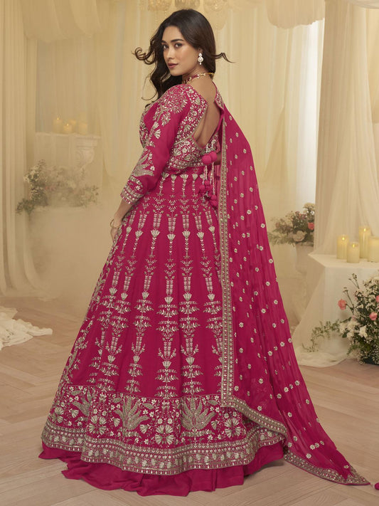 Embroidered Georgette Lehenga Style Suit in Fuchsia