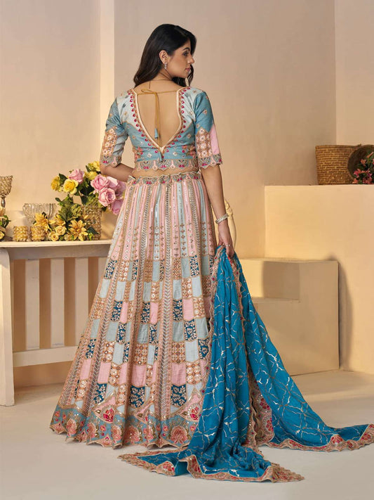 Powder blue Position print Jaal Patterned party wear lehengas with Sequin & Aari Work