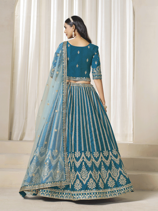 Trendy Teal Blue Art Silk Bridal Lehenga Choli with Heavy Golden Embroidery and Net Dupatta