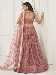 Mesmerizing Dusty Pink Thread Work Net Reception Wear Lehenga Choli