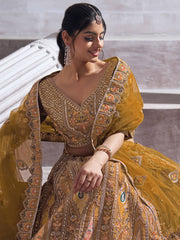 Earthy Mustard Color bridal lehenga with Patch and aari -Work Semi Stitched Lehenga Choli
