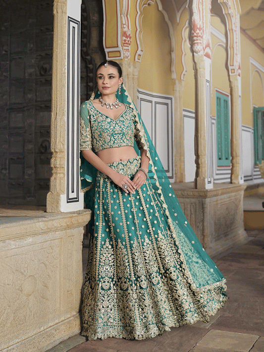 Designer Rama Net Embroidered Wedding Lehenga Choli