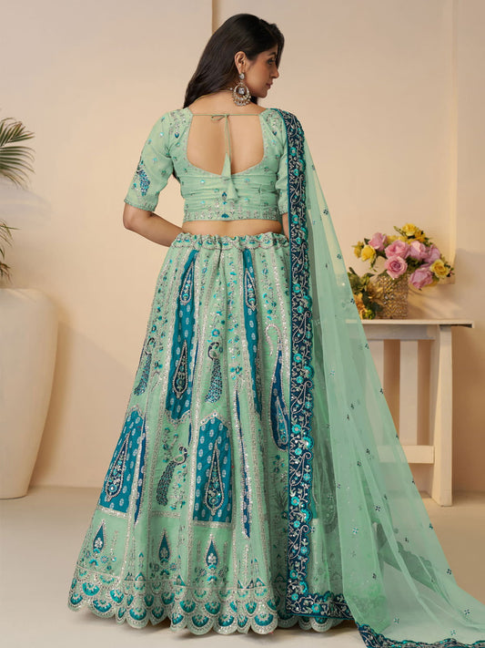 Royal Grandeur bridal sky blue Lehenga with Paisley and Peacock Motifs and Heavy Embroidery