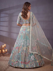Elegant Pista Green Embroidered Net Wedding Wear Lehenga Choli With Dupatta