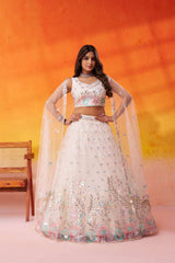 Cream Net Fabric Sequins Thread and Embroidery Semi Stitched Lehenga and Unstitched Blouse With Dupatta