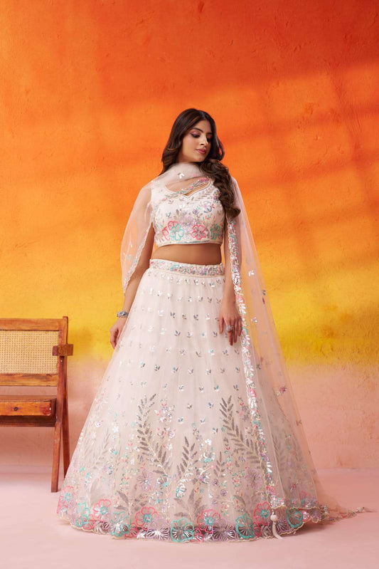 Cream Net Fabric Sequins Thread and Embroidery Semi Stitched Lehenga and Unstitched Blouse With Dupatta