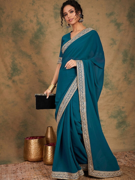 Teal blue Sequinned Detailed Pure Georgette Saree