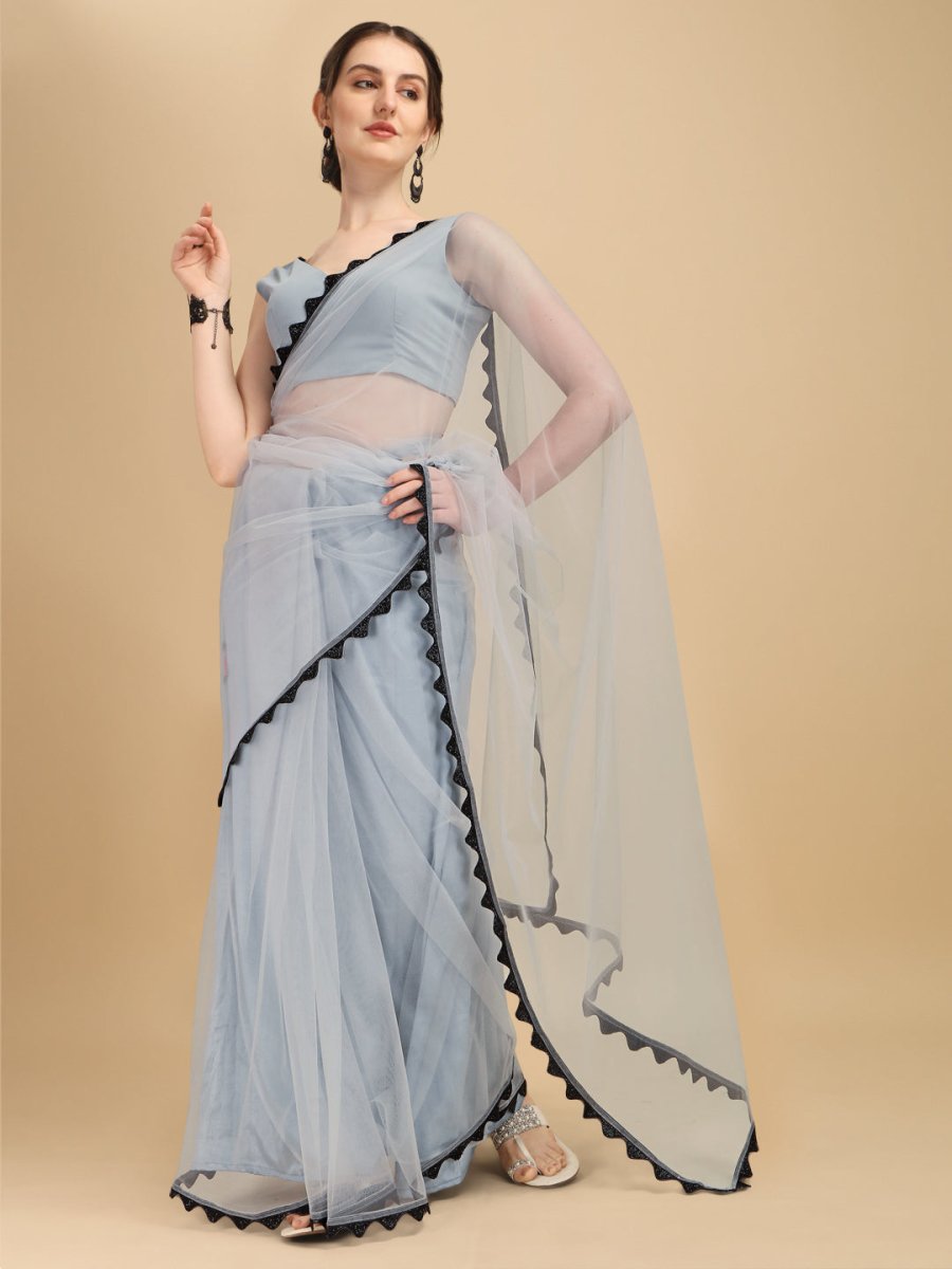 Black net saree with golden border top