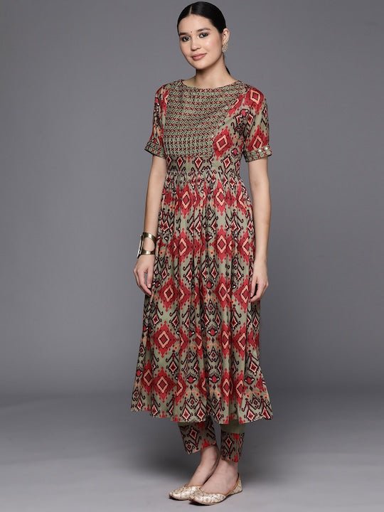 Tribal Embroidered Pleated Thread Work Kurta with Trousers - Inddus.com