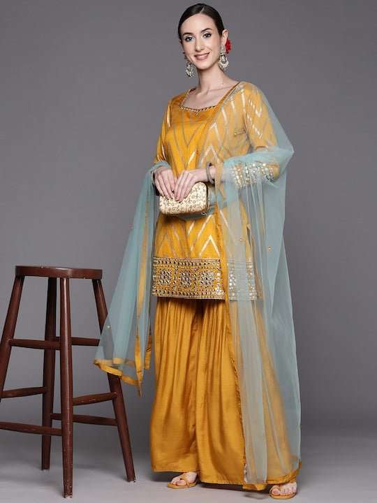 Women Mustard Yellow Mirror Work Kurta with Sharara & With Dupatta - Inddus.com