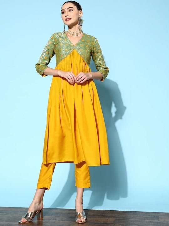 Women Mustard Yellow Pleated Kurta with Trousers - Inddus.com