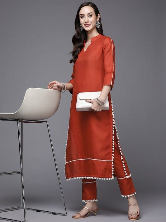 Women Rust Orange Solid Kurta with Trousers - Inddus.com