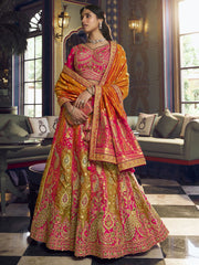Pink And Green Embroidered Silk Lehenga Choli