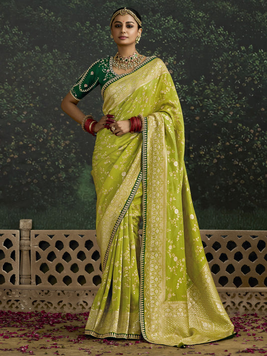 Bewitching Lime Green Zari Weaving Silk Traditional Saree With Blouse