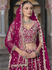 Designer Pink Net Embroidered Wedding Lehenga Choli