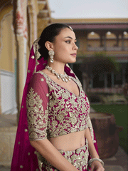 Designer Pink Net Embroidered Wedding Lehenga Choli