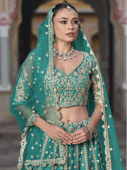 Designer Rama Net Embroidered Wedding Lehenga Choli