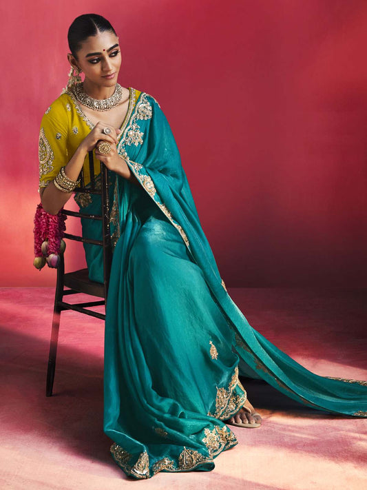 Peehu Soft Silk Embellished Border Saree In Turquoise Green