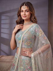 Elegant Pista Green Embroidered Net Wedding Wear Lehenga Choli With Dupatta