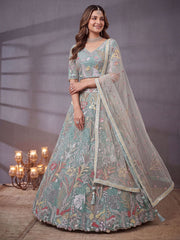 Elegant Pista Green Embroidered Net Wedding Wear Lehenga Choli With Dupatta