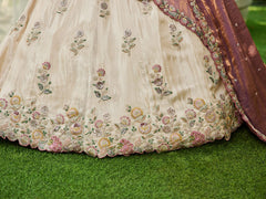 Cream colour tissue Fabric with Sequinse and Thread embroidery Semi-Stitched Lehenga choli and Dupatta