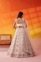 Cream Net Fabric Sequins embroidery Semi Stitched Lehenga and Unstitched Blouse With Dupatta