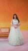 Cream Net Fabric Sequins Thread and Embroidery Semi Stitched Lehenga and Unstitched Blouse With Dupatta